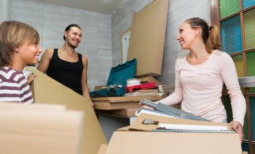 Local removals team handling a move in an Islington residential street
