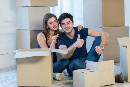 Residential move with boxes and furniture in an Islington home