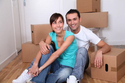 Packed boxes and furniture prepared for local removal van transport