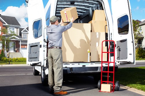 Man with van loading boxes for a move in Islington