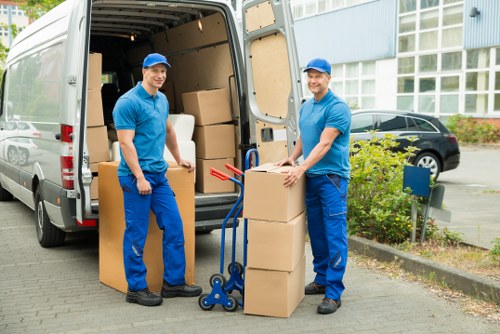 Local movers loading items for transport in Islington