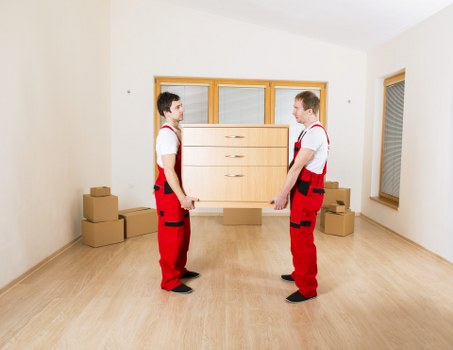 Packed boxes and household items ready for collection by local movers