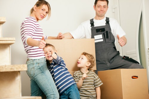 Prepared moving boxes and household items ready for an Islington home move